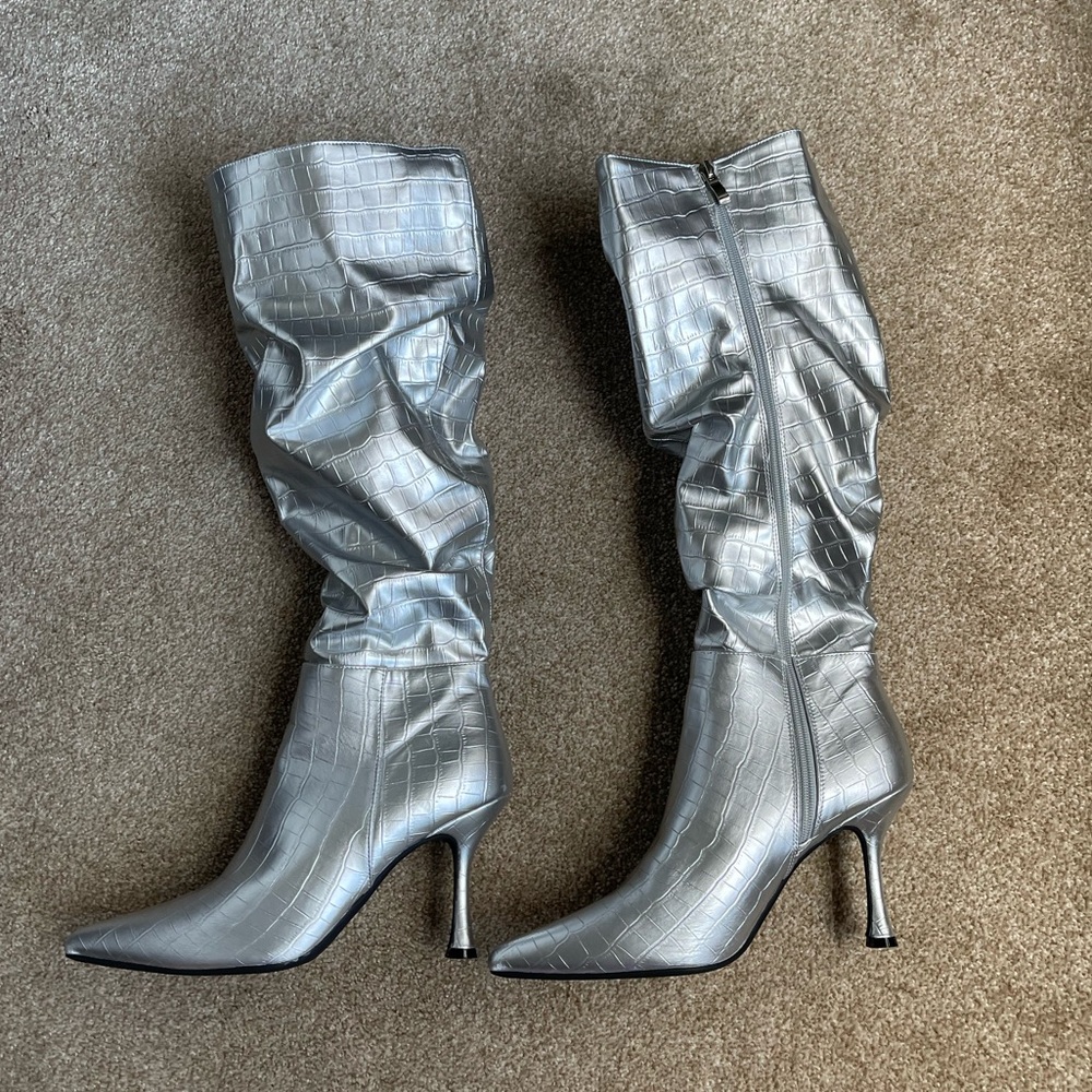 Never worn silver knee high boots size 40 (about a 9 women’s)